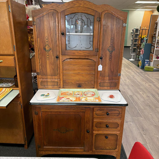 Porcelain top Hoosier style cabinet with accordion roll up door