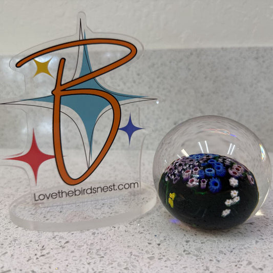 Floral signed paperweight