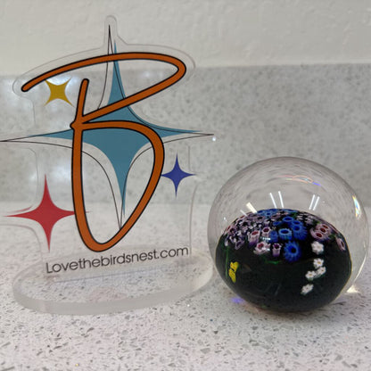 Floral signed paperweight