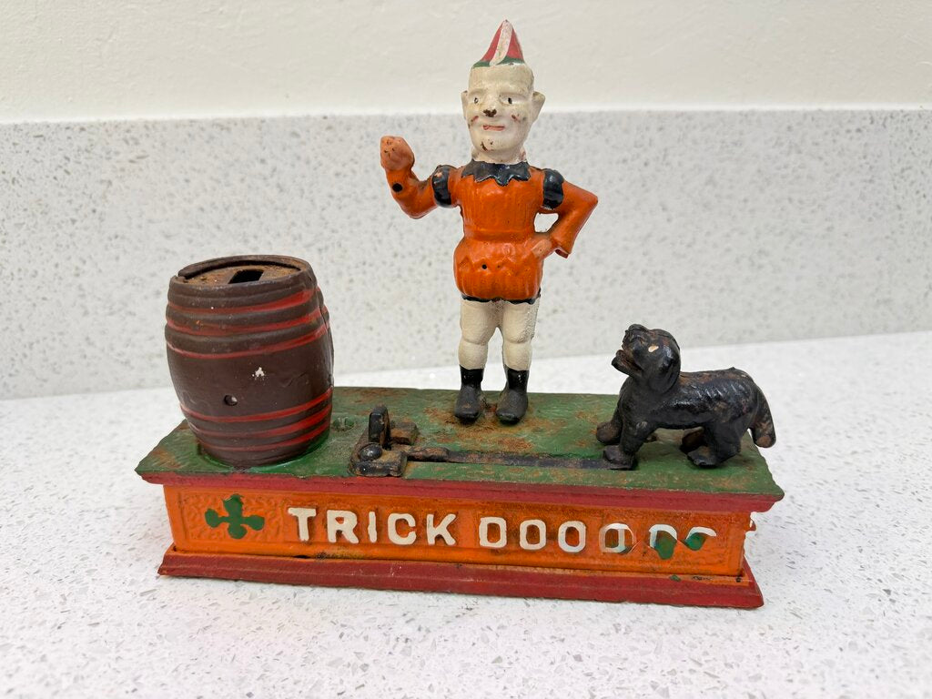 TRICK DOG CAST IRON COIN BANK